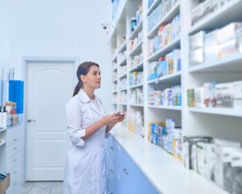 Female pharmacist working in a drugstore